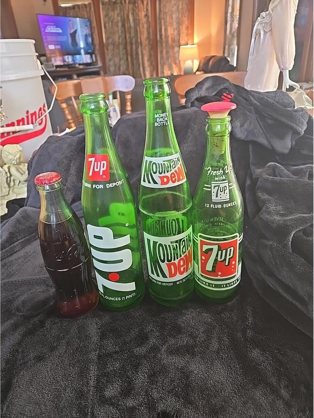 vintage soda bottles 2  7UP 1 Mountain Dew 1 Coke Classic
